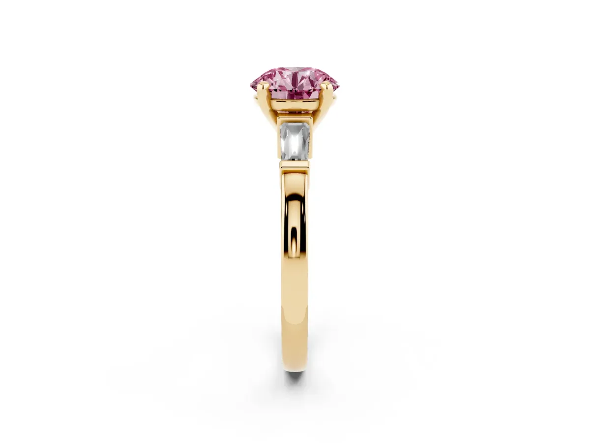 Fancy Pink Round Cut Cut Diamond Solitaire Ring with Tapered Baguette Accents and Four-Prong Setting Yellow gold
