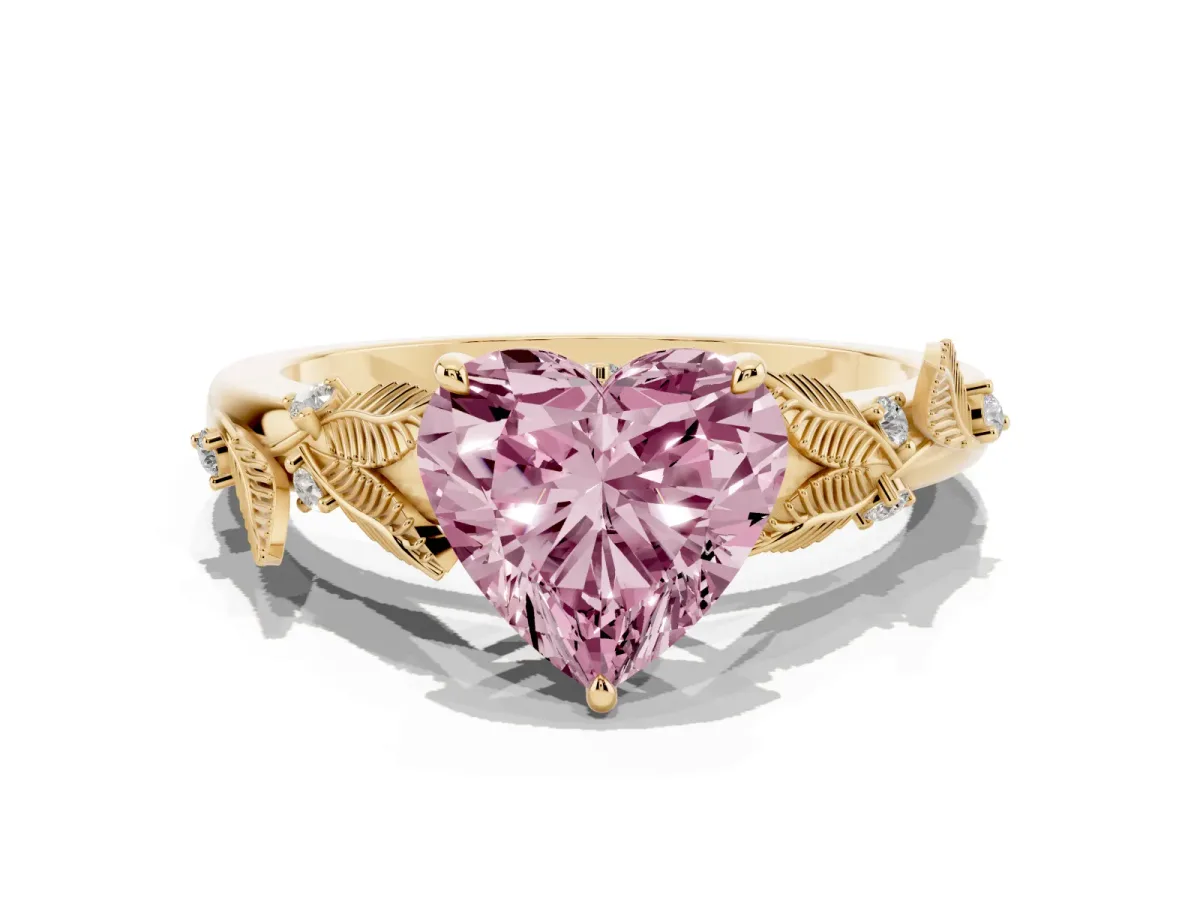 Fancy Pink Heart Cut Diamond Solitaire Ring with Leaf Motif Band and Four-Prong Setting Yellow gold