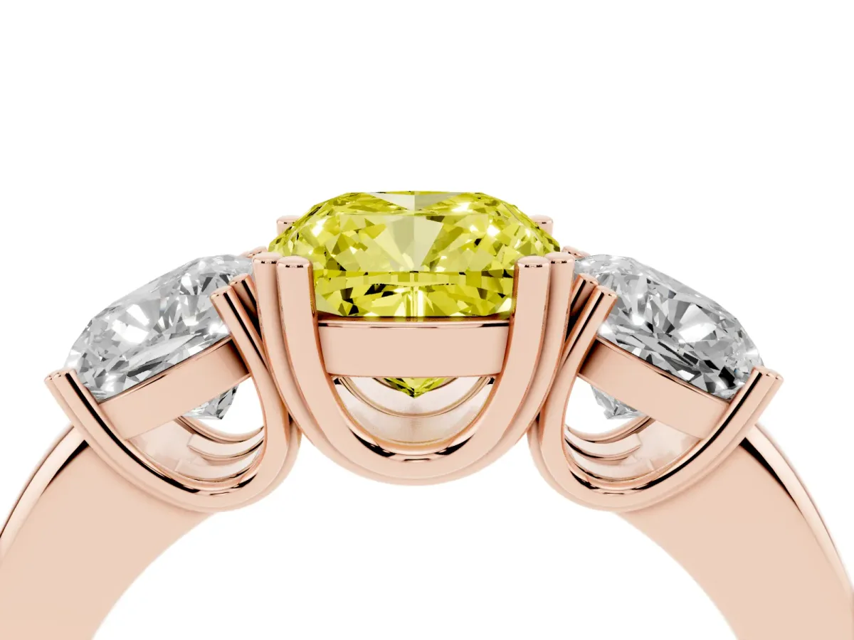 Fancy Yellow Three-Stone Cushion Cut Cut Diamond Ring with Channel Set Band and Four-Prong Setting Rose gold