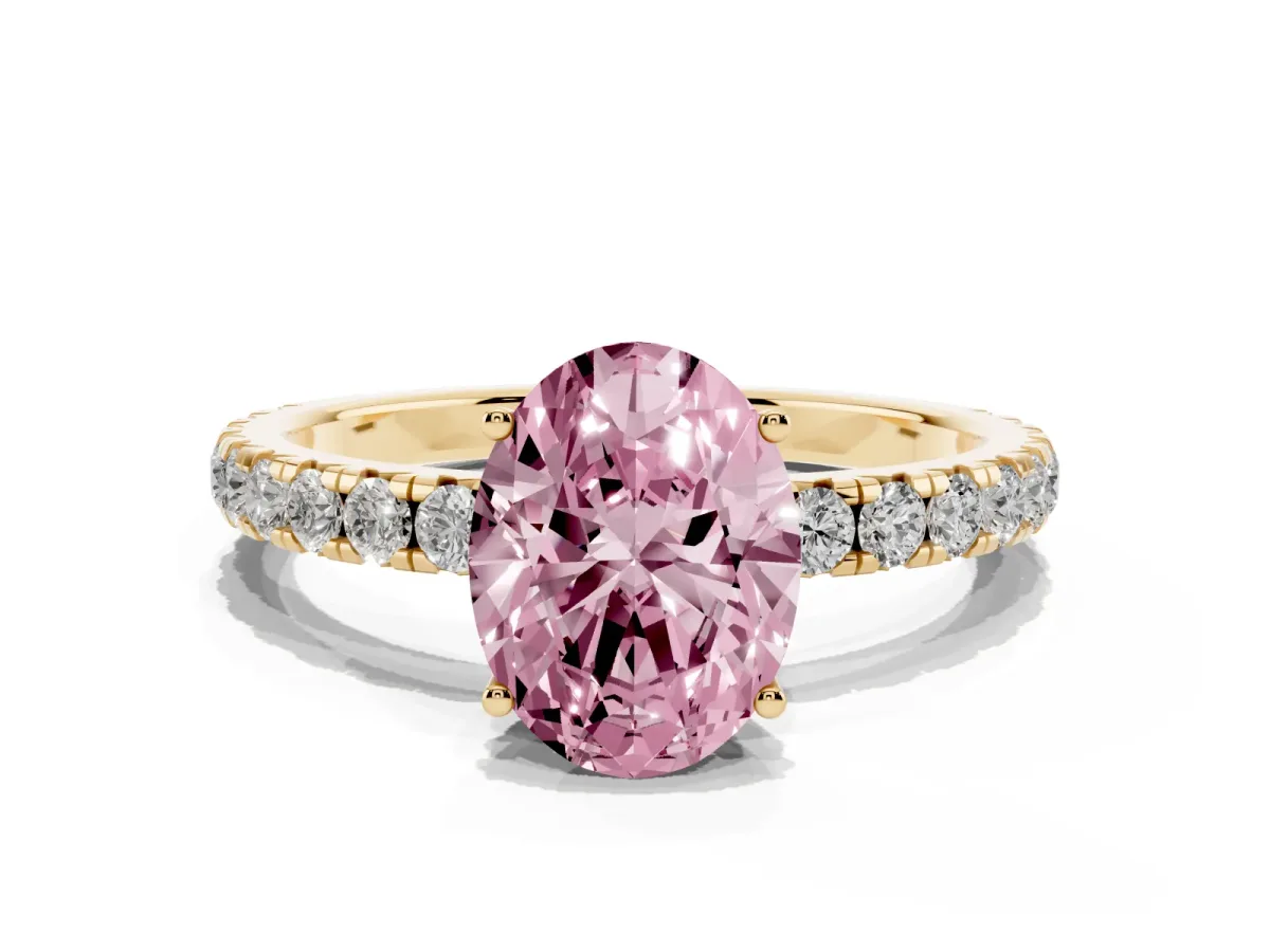 Fancy Pink Oval Cut Diamond Pavé Solitaire Engagement Ring with Four-Prong Setting Yellow gold