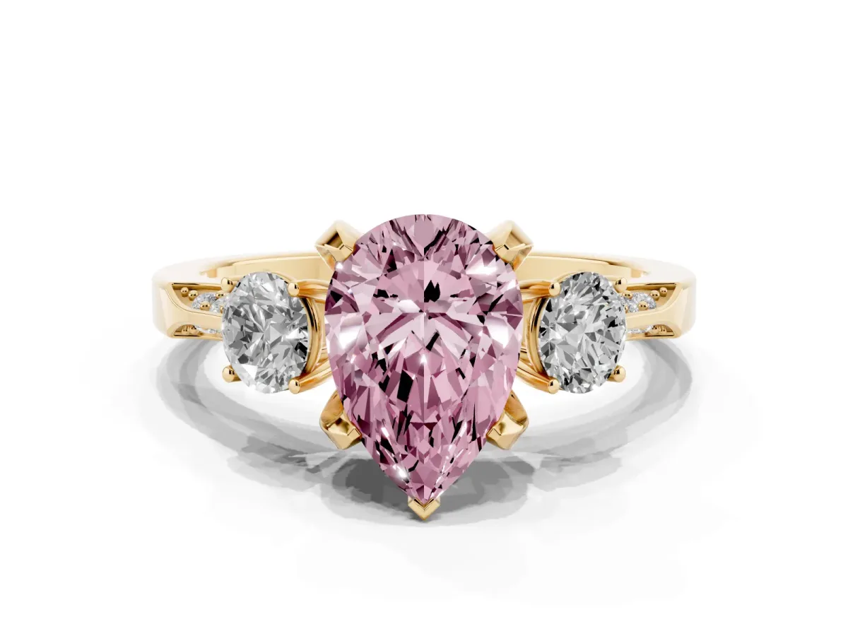 Fancy Pink Pear Cut Brilliant Three-Stone Diamond Ring with Pavé Band and Four-Prong Setting Yellow gold