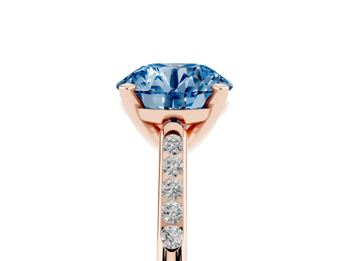 Fancy Blue Round Cut Diamond Solitaire Ring with Channel Set Round Band and Prong Setting Rose gold