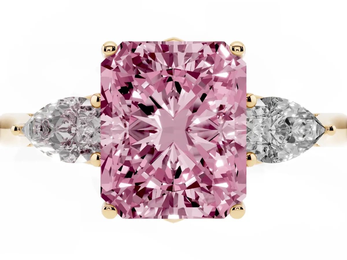 Fancy Pink Radiant Cut Diamond Three-Stone Ring with Pear Side Stones and Prong Setting Yellow gold