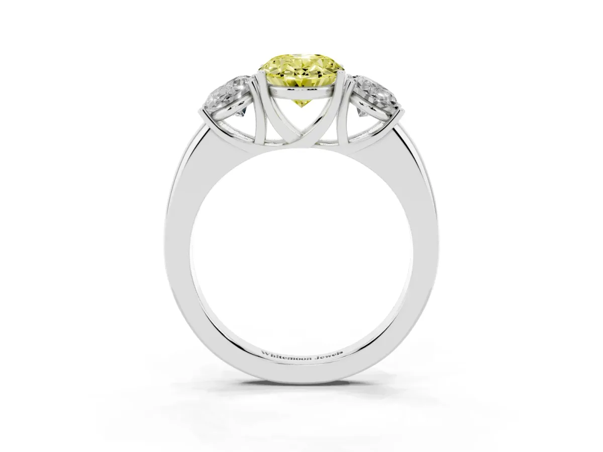 Fancy Yellow Oval Cut Diamond Three-Stone Ring with Four-Prong Setting and Classic Band Silver
