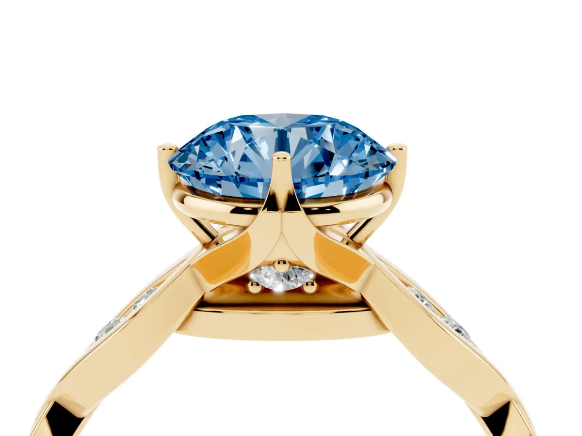 Fancy Blue Round Cut Solitaire Twist Band with Leaf Prong Setting Yellow gold