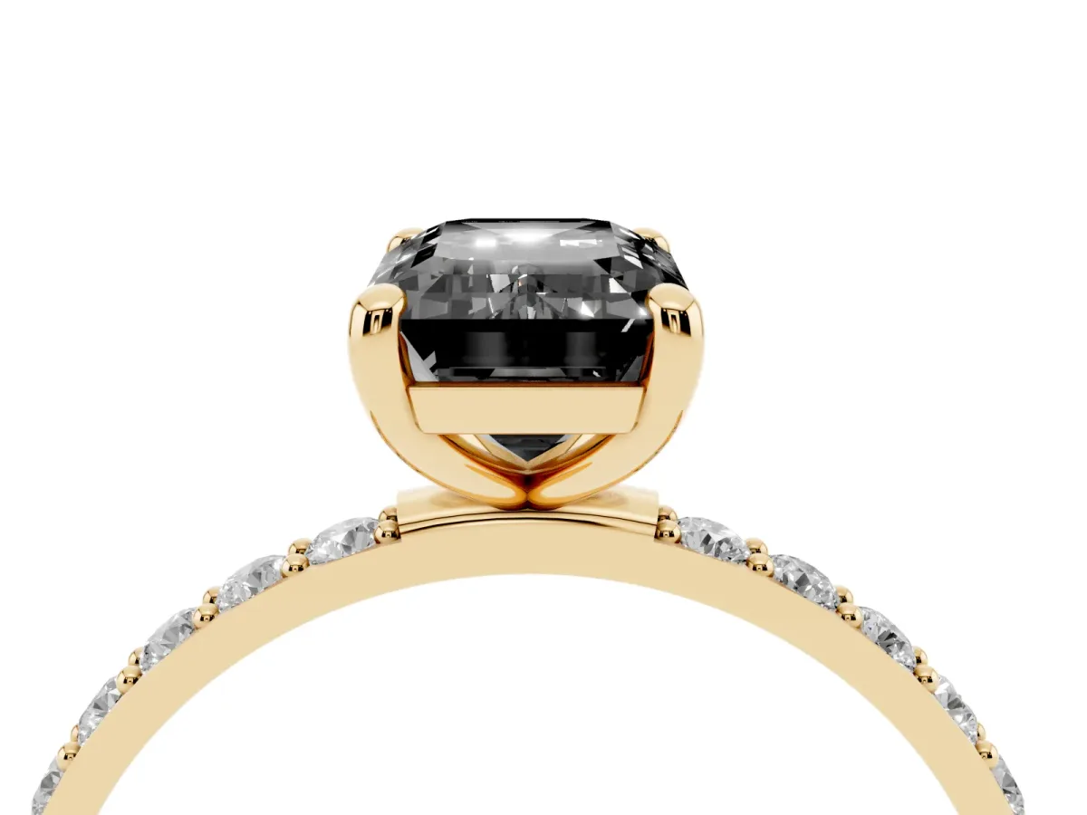 Fancy Black Emerald Cut Diamond Solitaire Ring with Round Pavé Band and Prong Setting Yellow gold