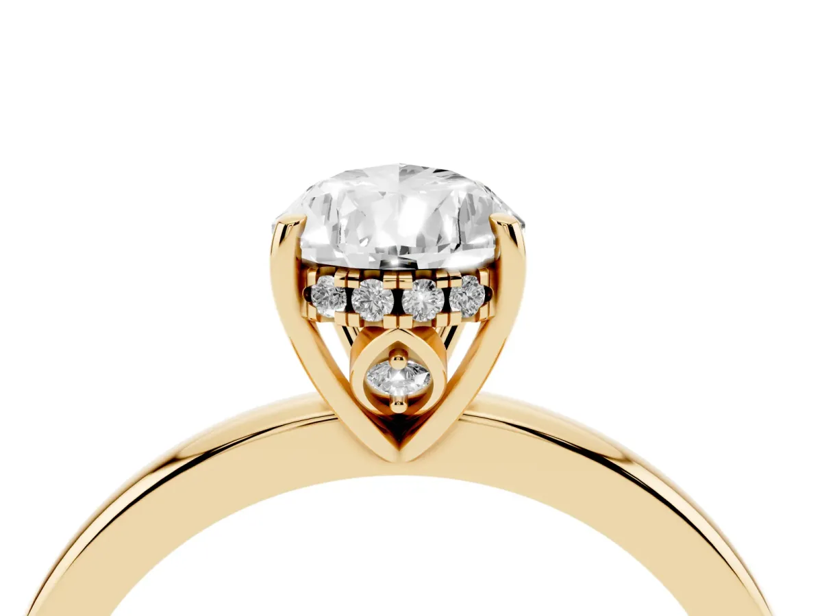 Pear Cut Solitaire Diamond Ring with Prong Setting and Plain Band Yellow gold