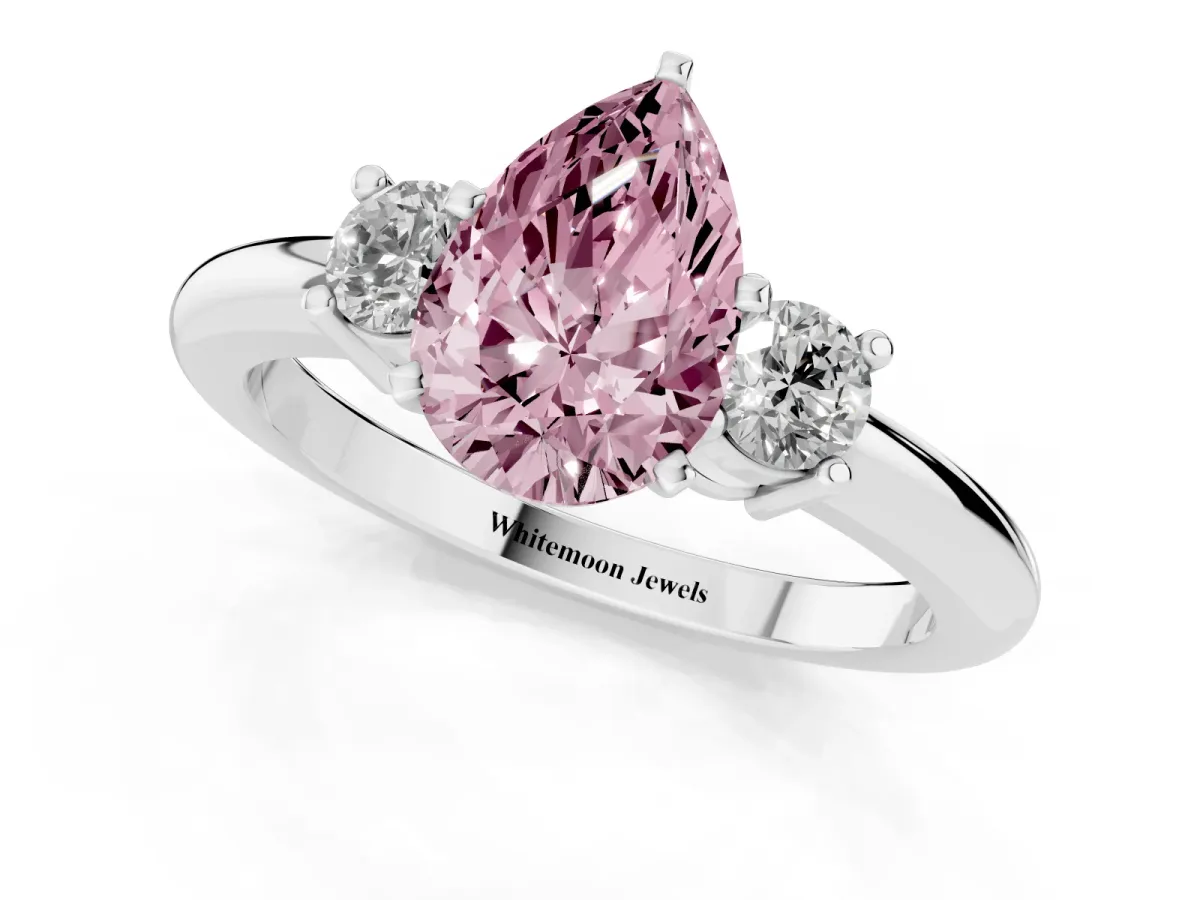 Fancy Pink Three-Stone Pear Cut Cut Diamond Solitaire with Prong Setting and Classic Band Silver