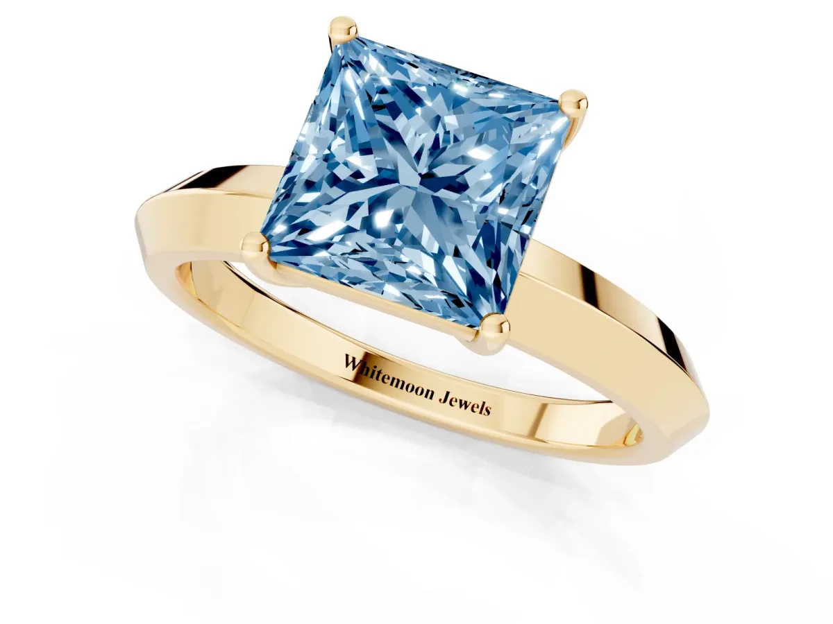 Fancy Blue Princess Cut Cut Solitaire Engagement Ring with Flat Band and Four-Prong Setting Yellow gold