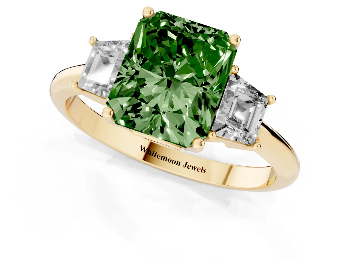 Fancy Green Radiant Cut Diamond Three-Stone Ring with Trapezoid Side Stones and Prong Setting Yellow gold