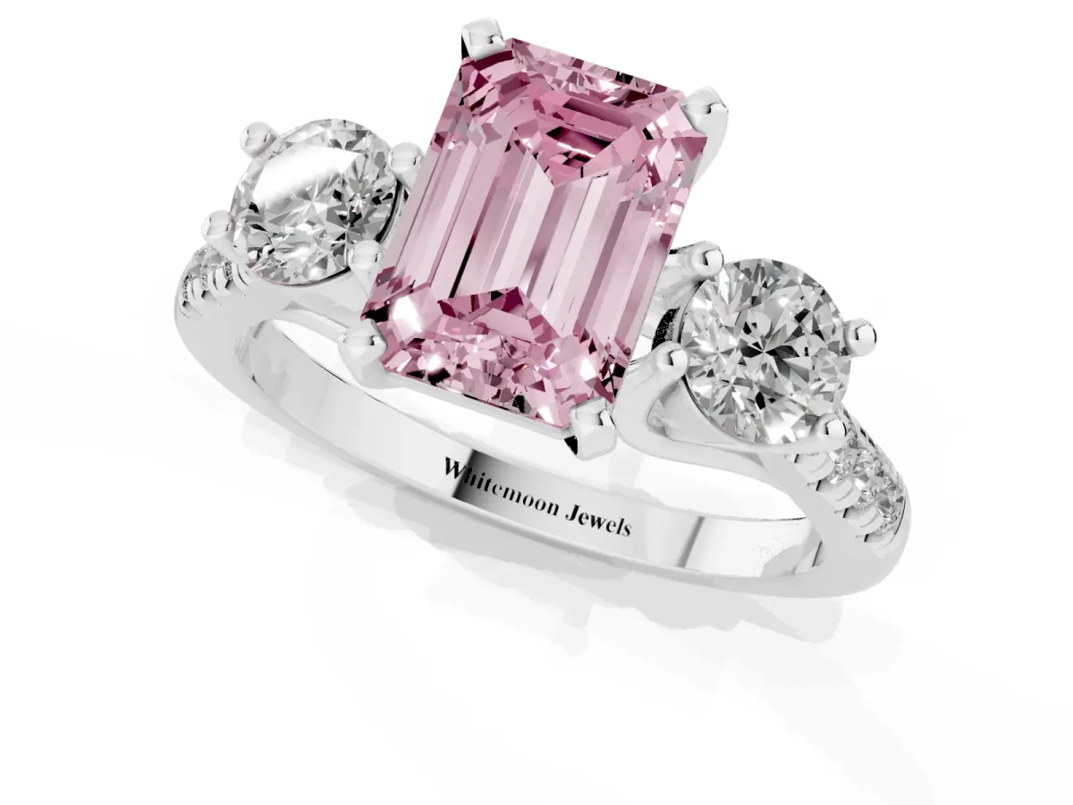 Fancy Pink Three-Stone Emerald Cut Diamond Pavé Band with Four-Prong Setting Platinum