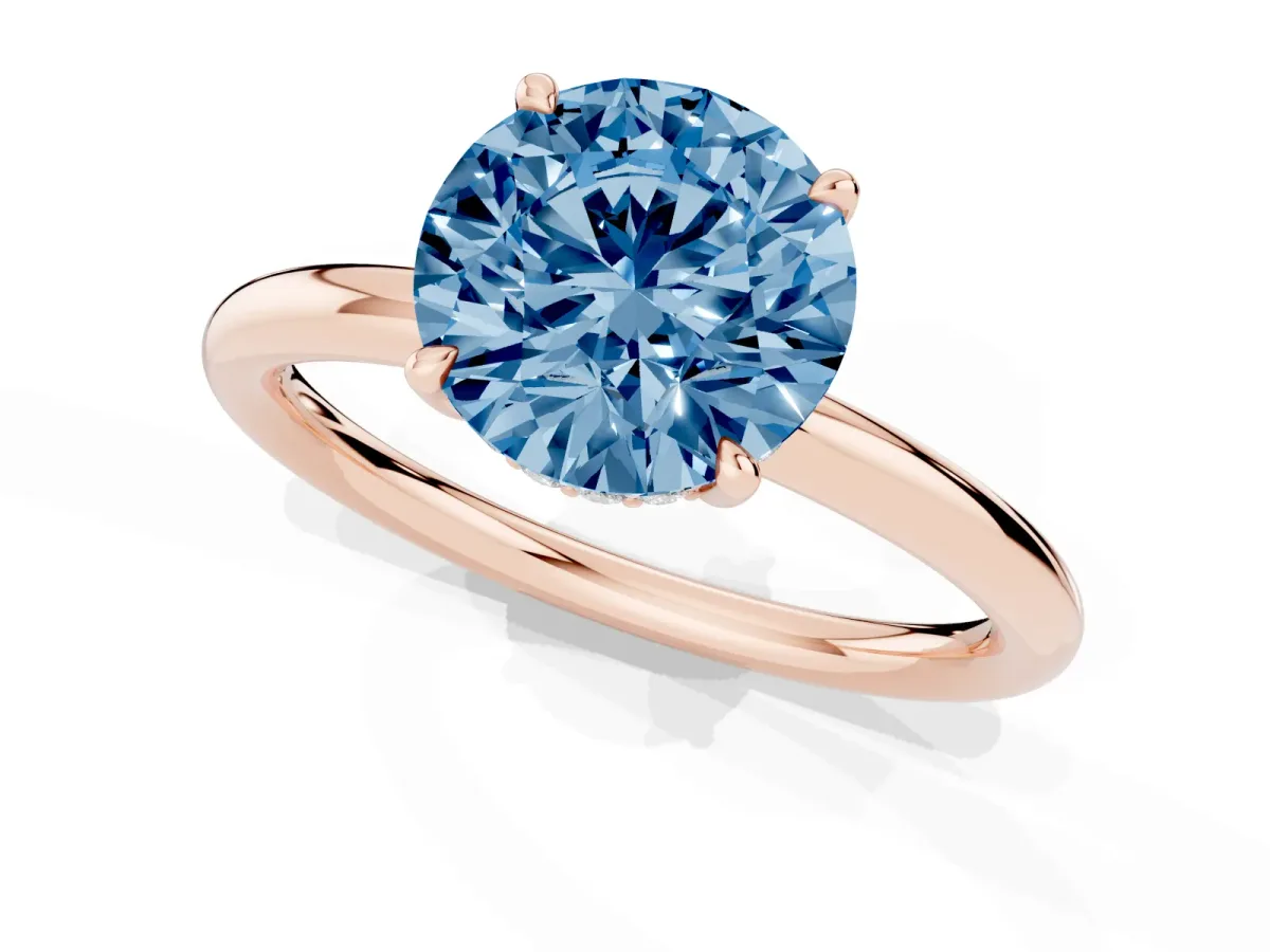 Fancy Blue Round Cut Diamond Solitaire Ring with Thin Band and Four-Prong Setting Rose gold