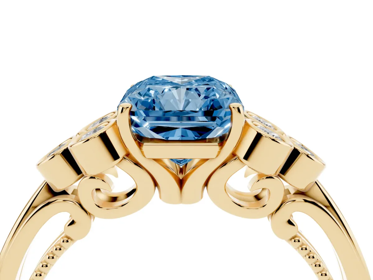 Fancy Blue Radiant Cut Cut Diamond Engagement Ring with Bezel Set Round Side Stones and Prong Setting Yellow gold