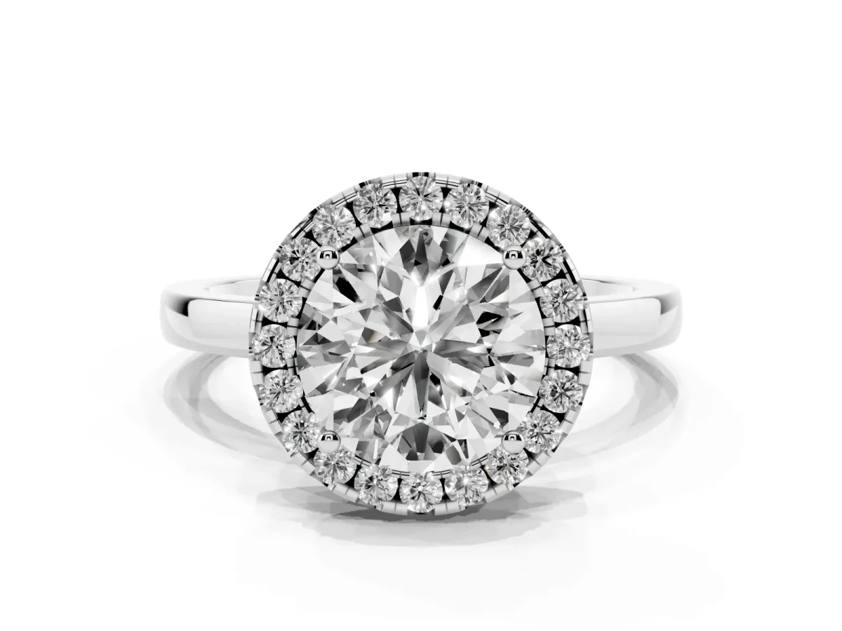 Round Cut Halo Diamond Solitaire with Pavé Band and Four-Prong Setting Silver