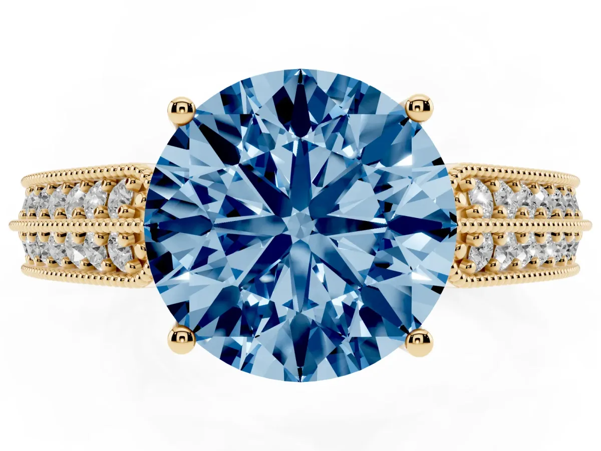 Fancy Blue Round Cut Cut Pave Split Shank Engagement Ring with Four-Prong Setting Yellow gold