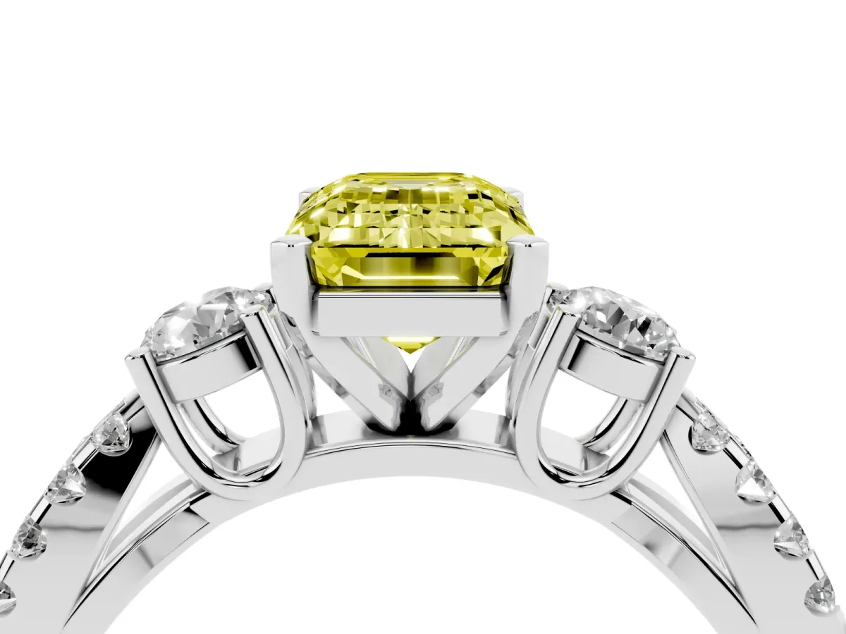 Fancy Yellow Emerald Cut Diamond Three-Stone Ring with Pavé Split Shank and Four-Prong Setting Silver