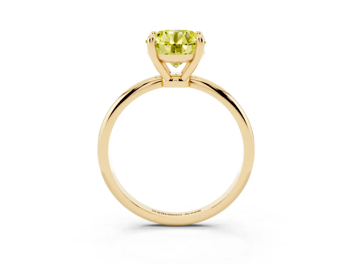 Fancy Yellow Round Cut Solitaire Diamond Ring with 4-Prong Setting on a Classic Band Yellow gold