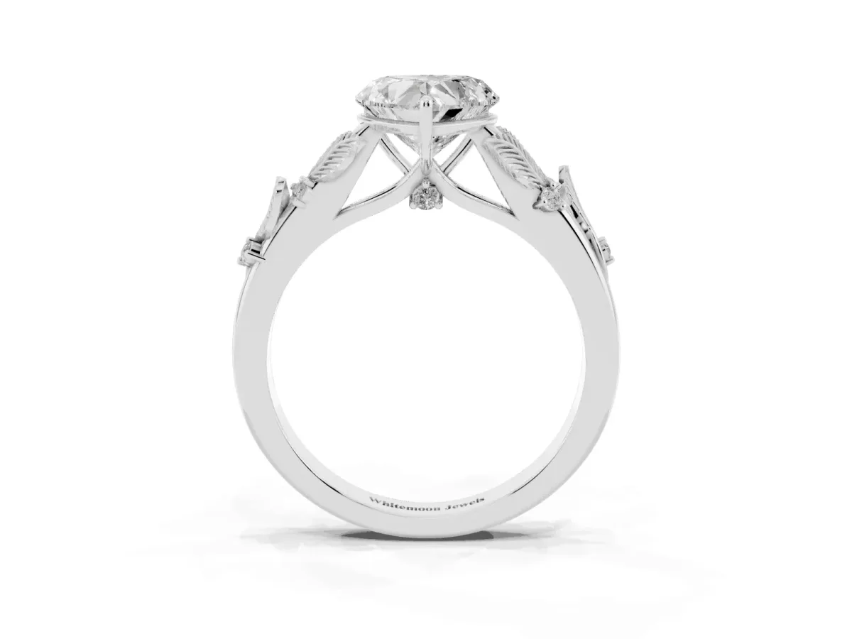 Heart Cut Diamond Solitaire Ring with Leaf Motif Band and Four-Prong Setting Silver
