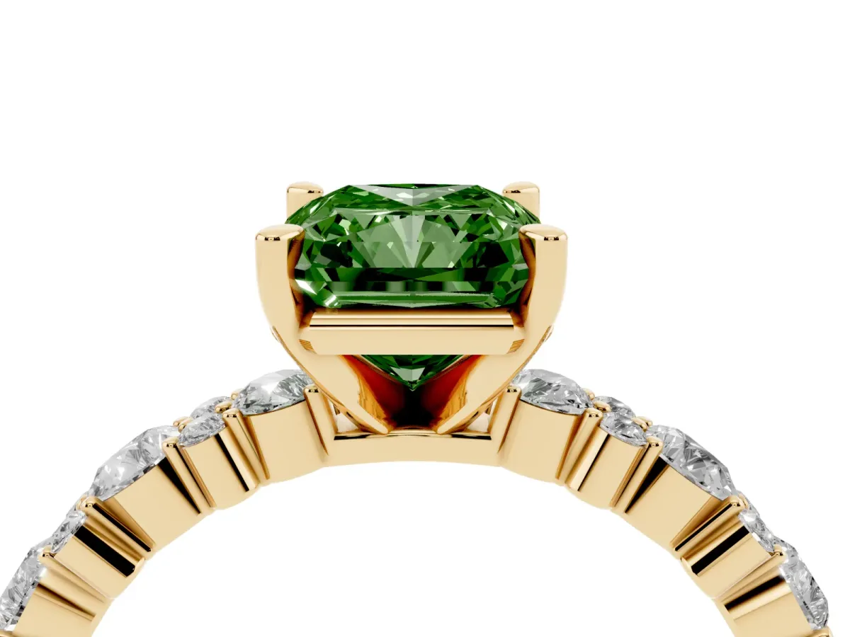 Fancy Green Radiant Cut Diamond Side Stone Solitaire Ring with Round and Four-Prong Setting Yellow gold
