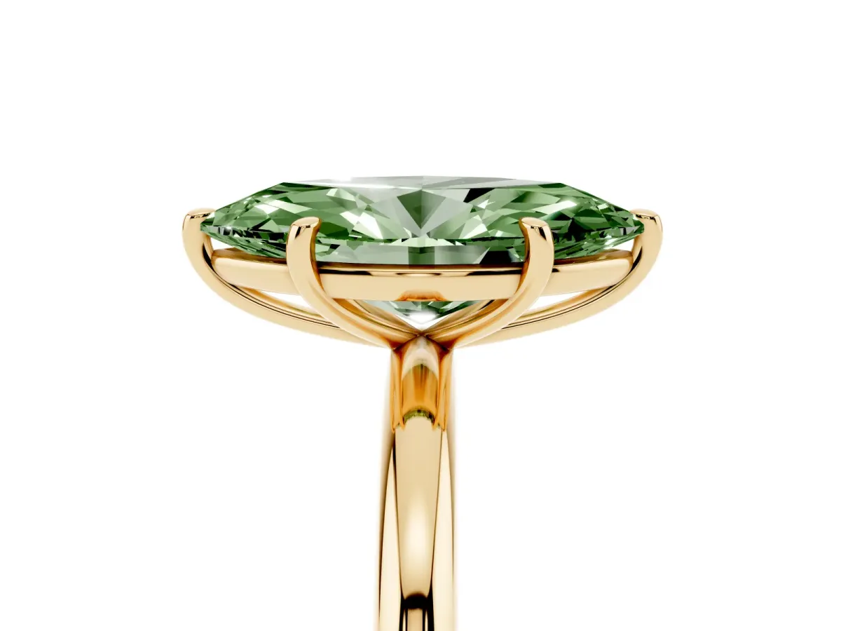 Fancy Green Oval Cut Solitaire Diamond Ring with Four-Prong Setting on a Plain Band Yellow gold