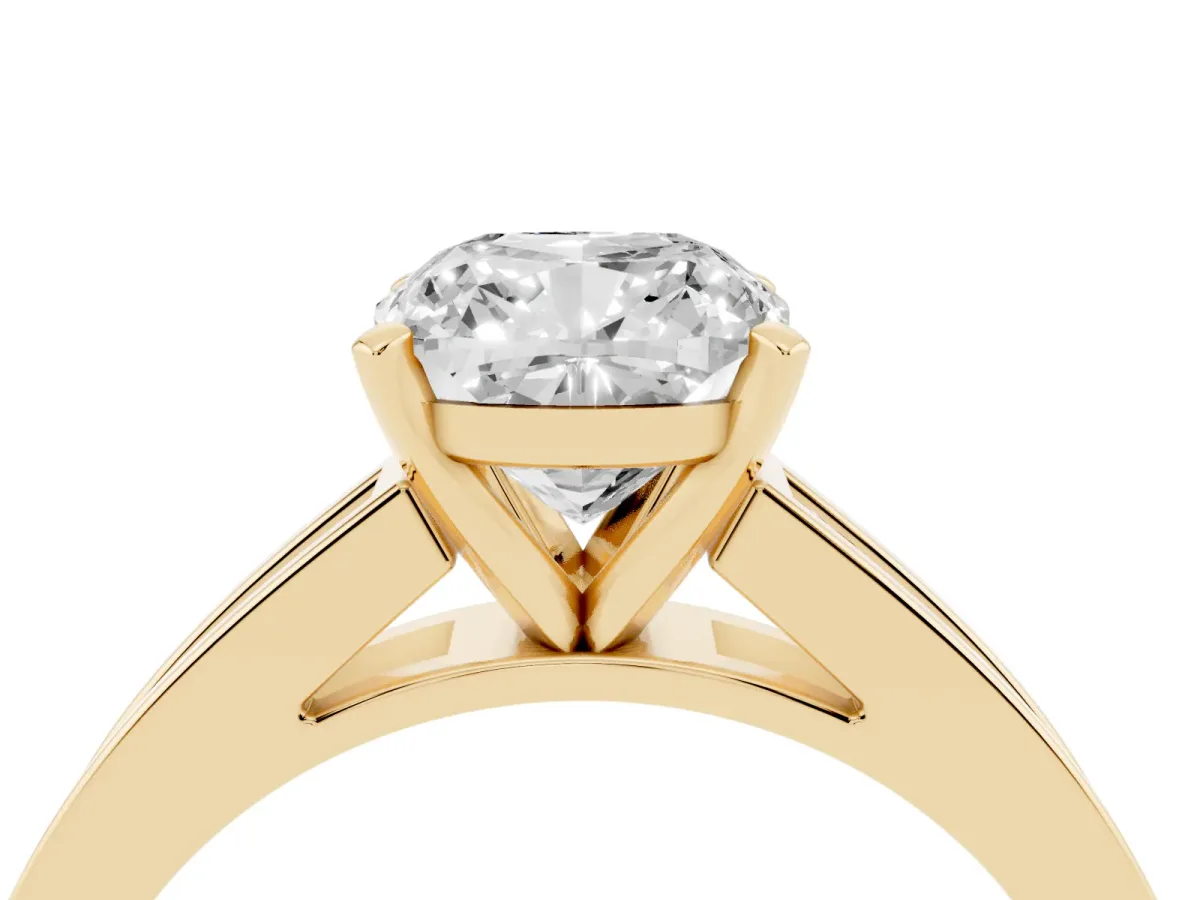 Cushion Cut Solitaire Diamond Ring with Channel-Set Band and Four-Prong Setting Yellow gold