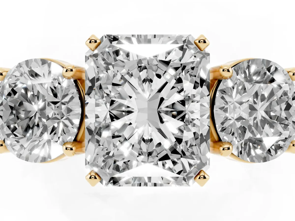 Three-Stone Radiant Cut Diamond Ring with Round Side Stones, Classic Band, and Four-Prong Setting Yellow gold