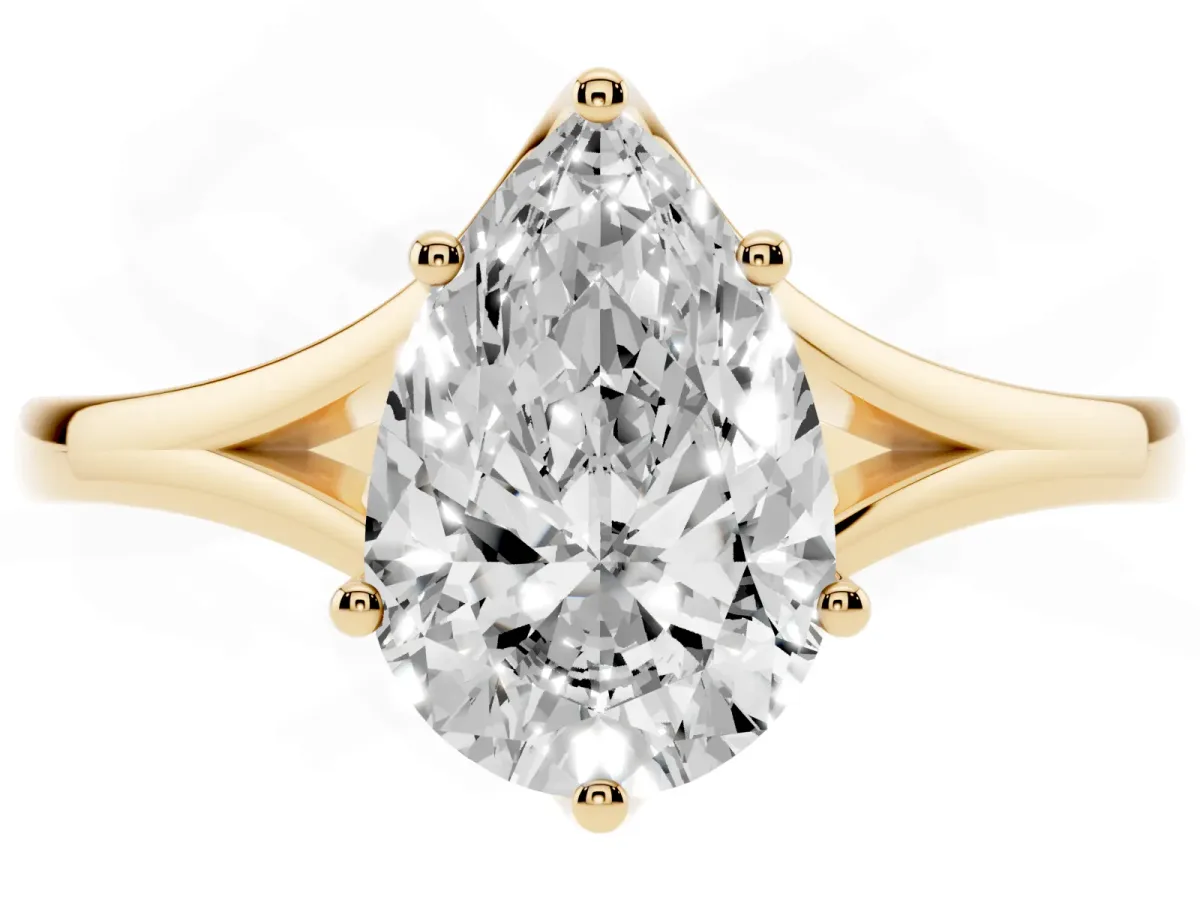 Pear Cut Solitaire Diamond Ring with Six-Prong Setting and Tapered Band Yellow gold
