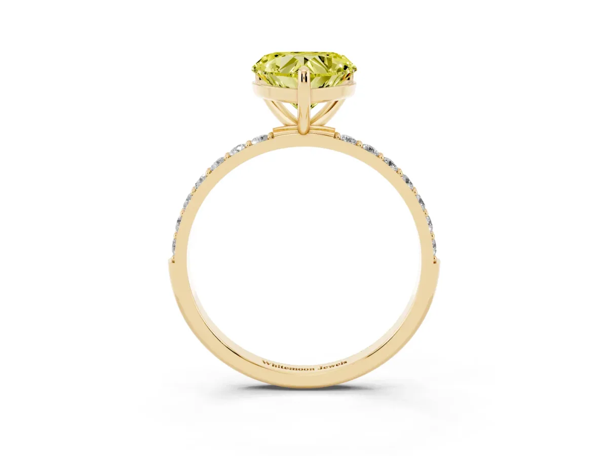 Fancy Yellow Heart Cut Diamond Solitaire Ring with Round Pavé Band and Prong Setting Yellow gold