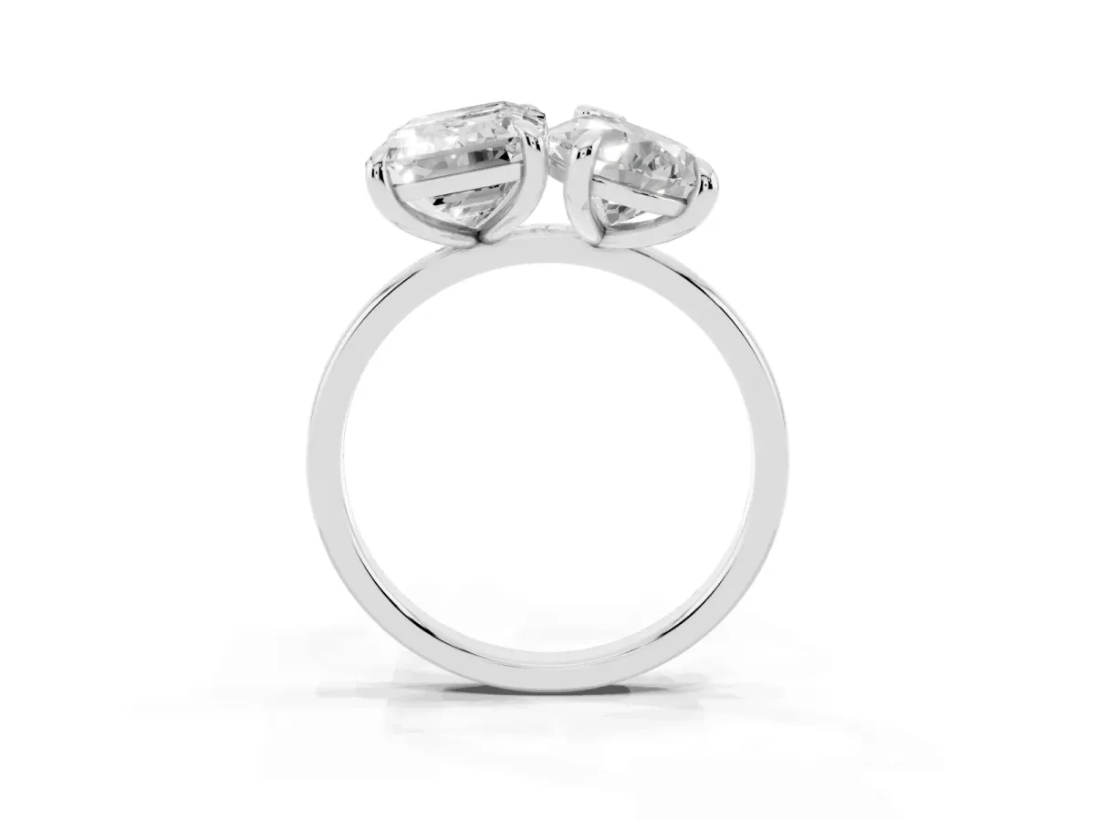 Pear and Emerald Toi Moi Ring with Prong Setting and Plain Band Silver