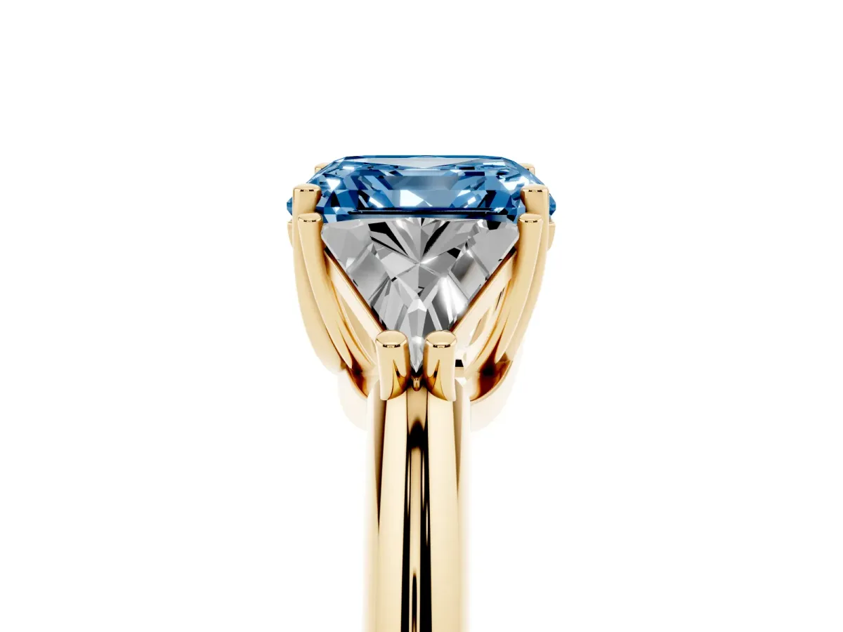 Fancy Blue Three-Stone Asscher Cut Diamond Engagement Ring with Trillion Side Stones and Prong Setting Yellow gold