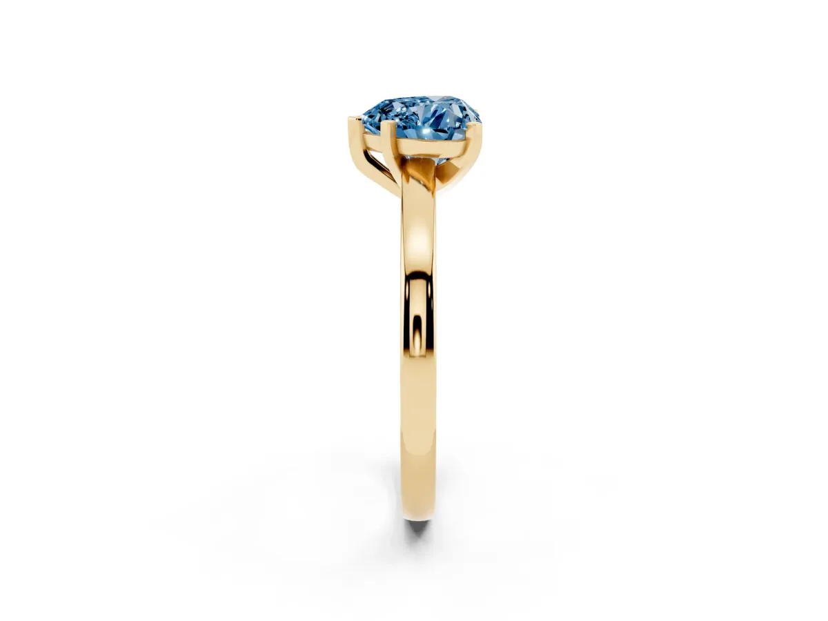 Fancy Blue Heart Cut Solitaire Diamond Engagement Ring with Four-Prong Setting on a Classic Band Yellow gold
