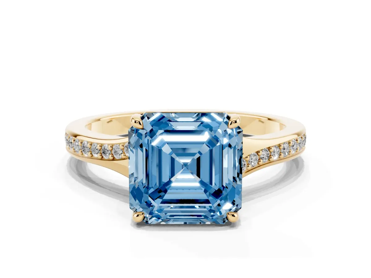 Fancy Blue Asscher Cut Diamond Solitaire Ring with Pavé Band and Prong Setting Yellow gold