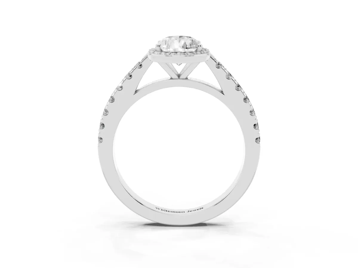 Pear Cut Cut Halo Diamond Engagement Ring with Pave Band and Four-Prong Setting Platinum