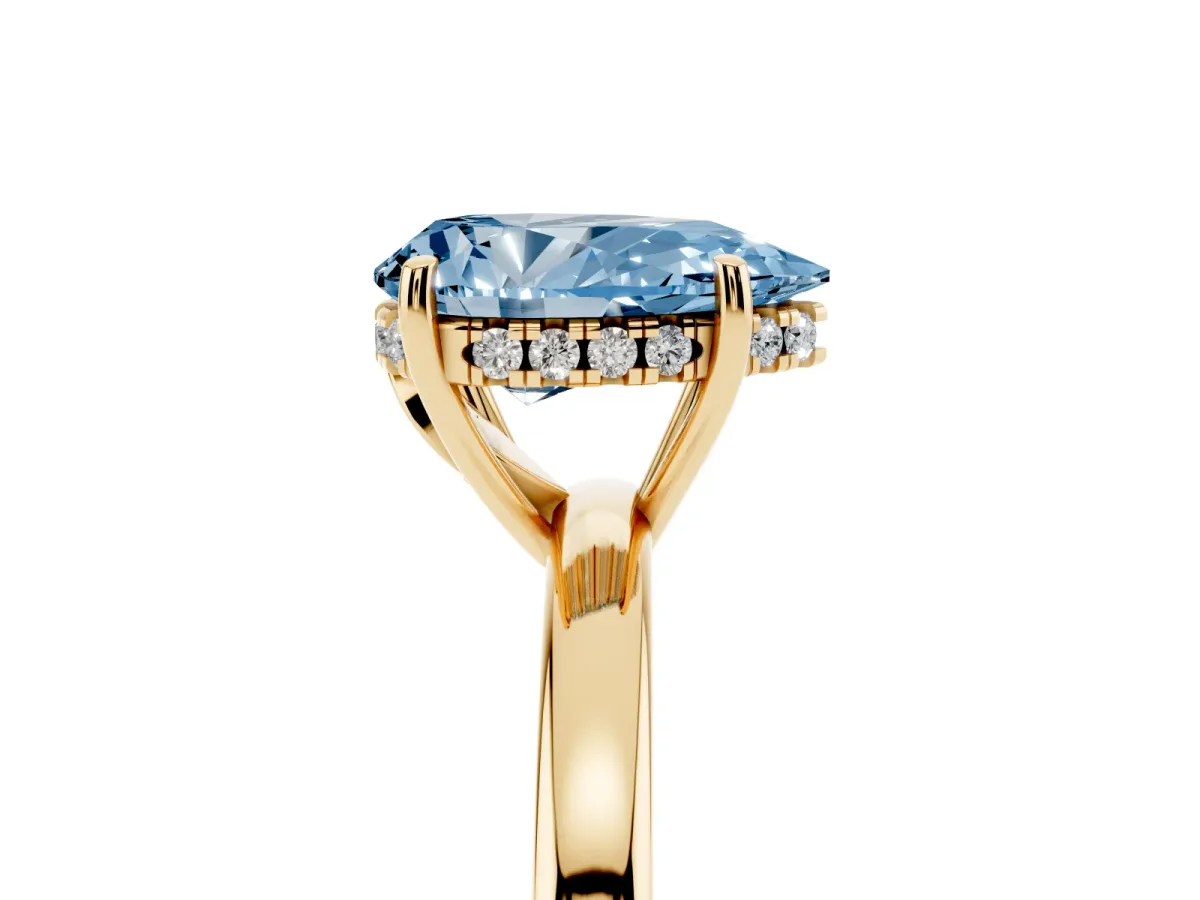 Fancy Blue Pear Cut Solitaire Diamond Ring with Prong Setting and Plain Band Yellow gold