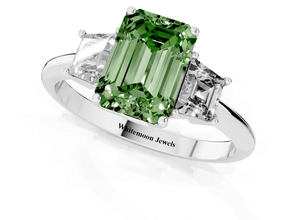 Fancy Green Emerald Cut Diamond Three-Stone Ring with Trapezoid Side Stones and Prong Setting Silver