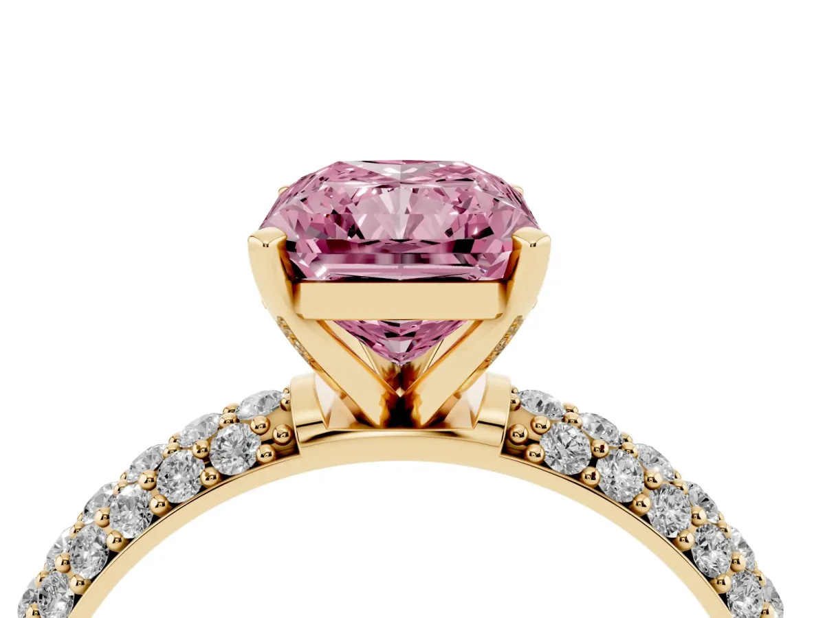 Fancy Pink Radiant Cut Diamond Solitaire Ring with Prong Setting and Pavé Band Yellow gold