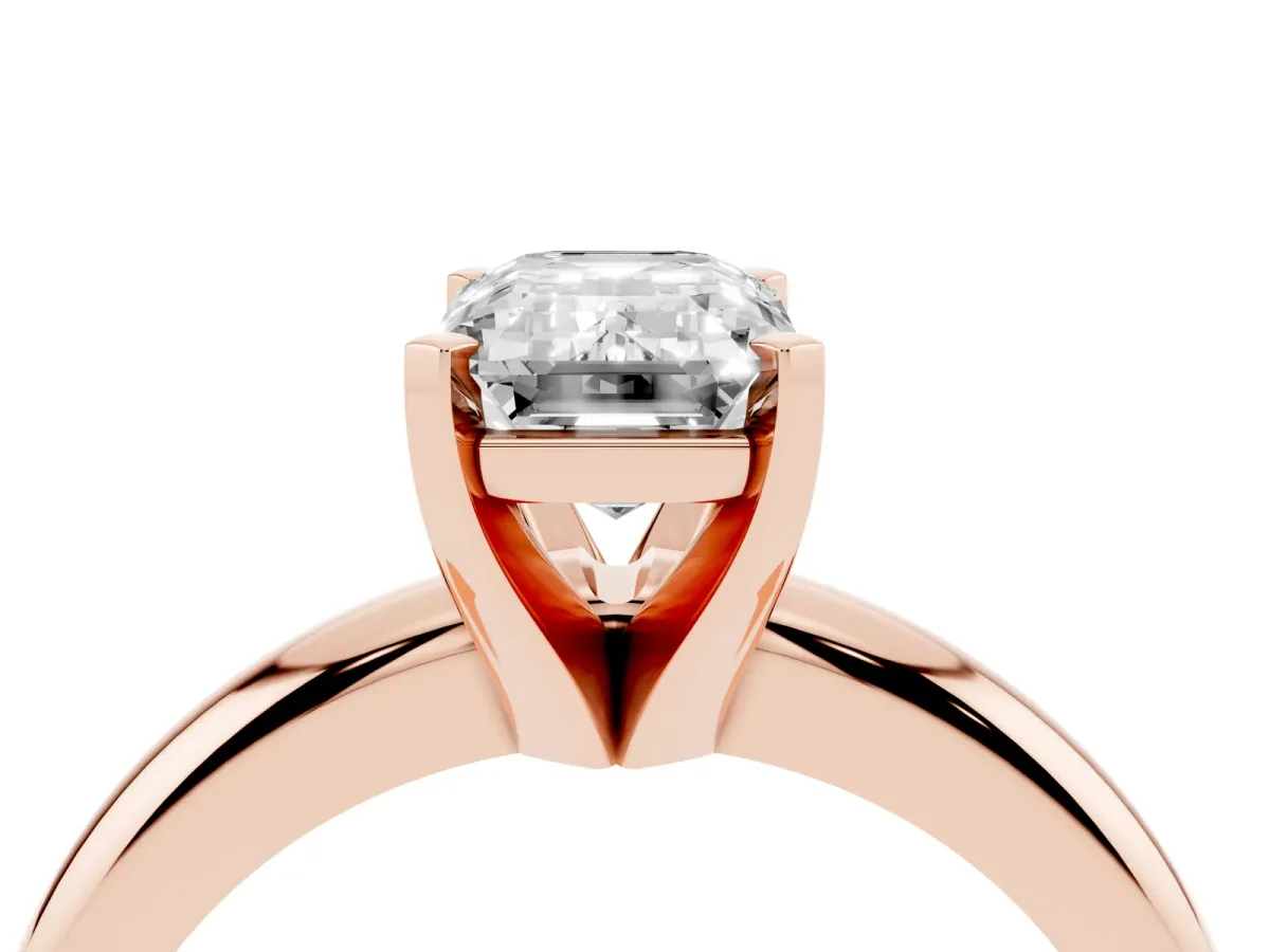 Emerald Cut Diamond Solitaire Engagement Ring with Round Band and Four-Prong Setting Rose gold