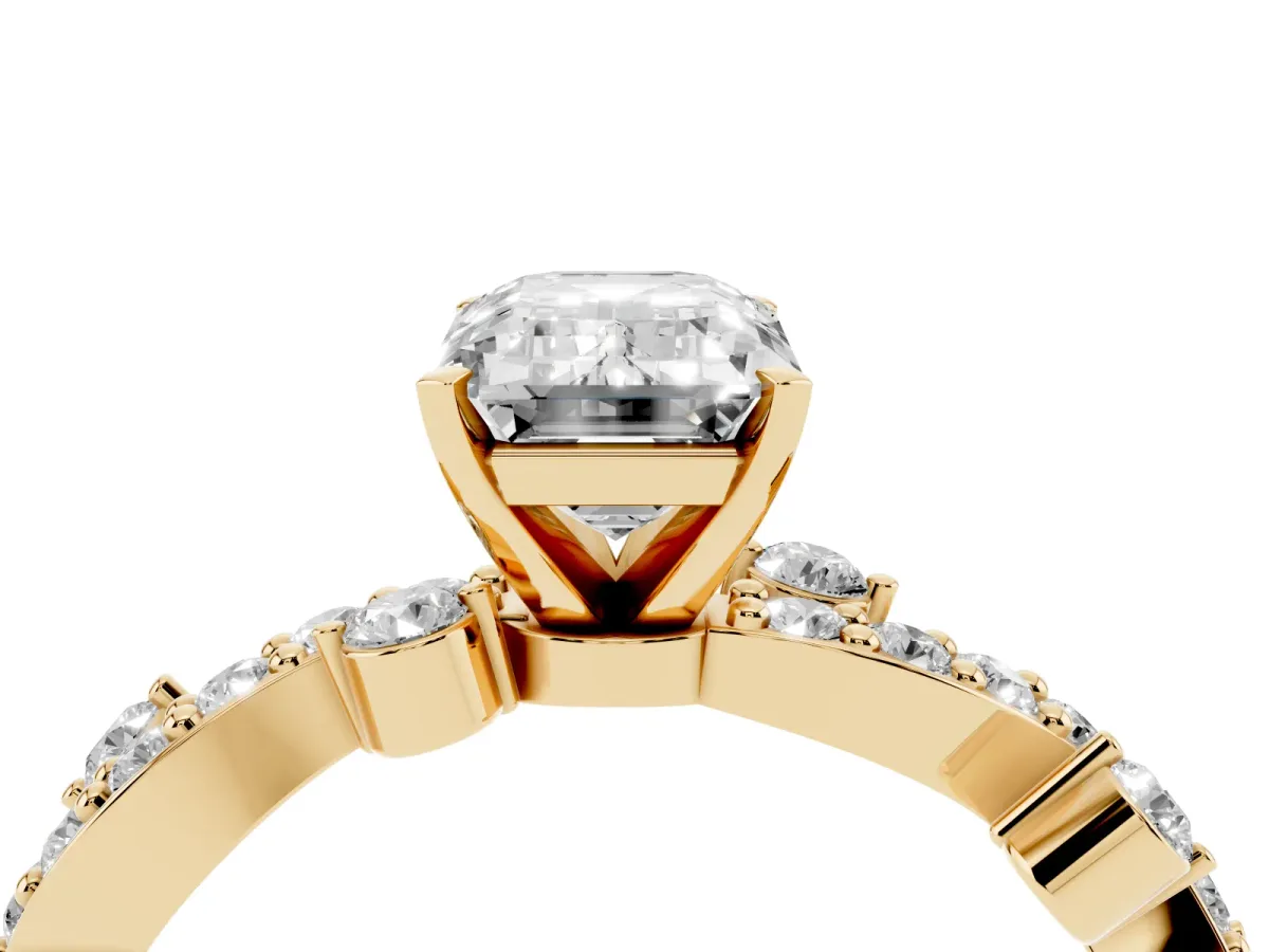 Emerald Cut Cut Solitaire Diamond Twisted Band with Pave Setting Yellow gold