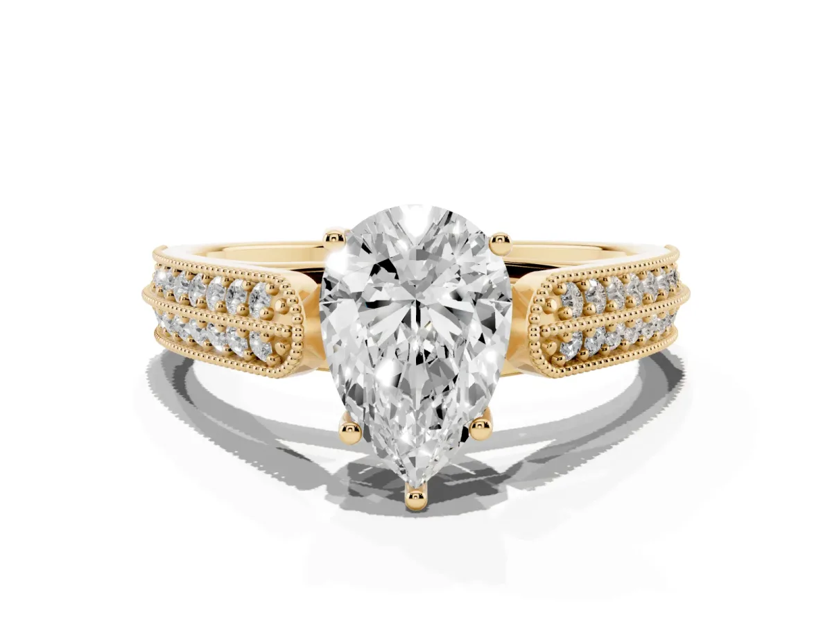Pear Cut Cut Pave Split Shank Engagement Ring with Four-Prong Setting Yellow gold