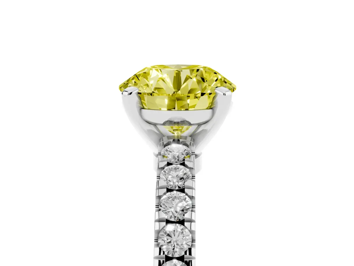 Fancy Yellow Round Cut Solitaire Diamond with Pavé Band and Four-Prong Setting Platinum