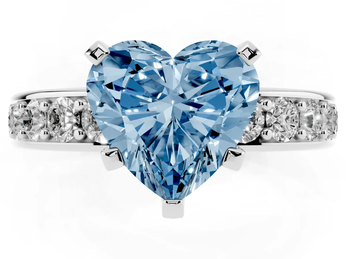 Fancy Blue Heart Cut Diamond Engagement Ring with Channel Set Round Band and Prong Setting Silver