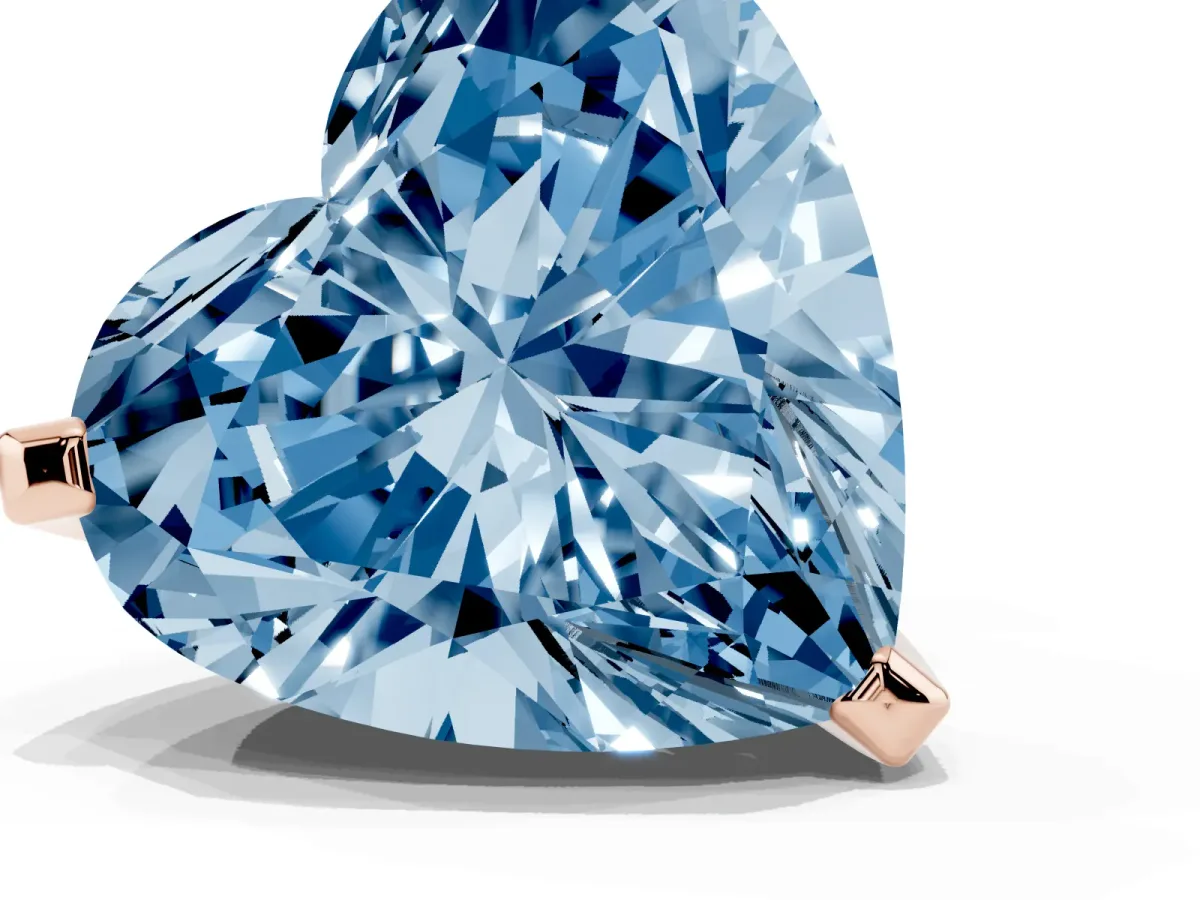 Fancy Blue Heart Cut Diamond Solitaire Ring with Prong Setting and Classic Band Rose gold