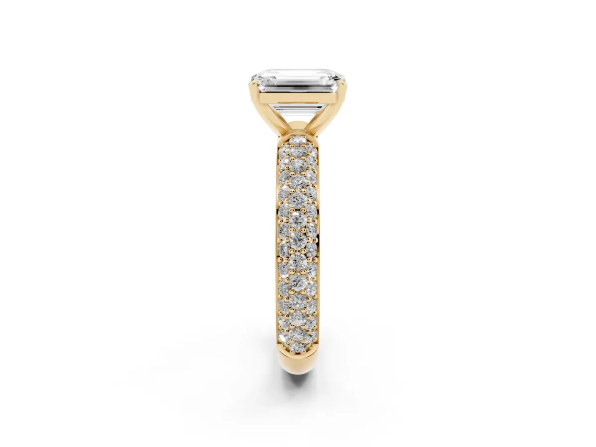 Emerald Cut Diamond Solitaire Ring with Prong Setting and Pavé Band Yellow gold