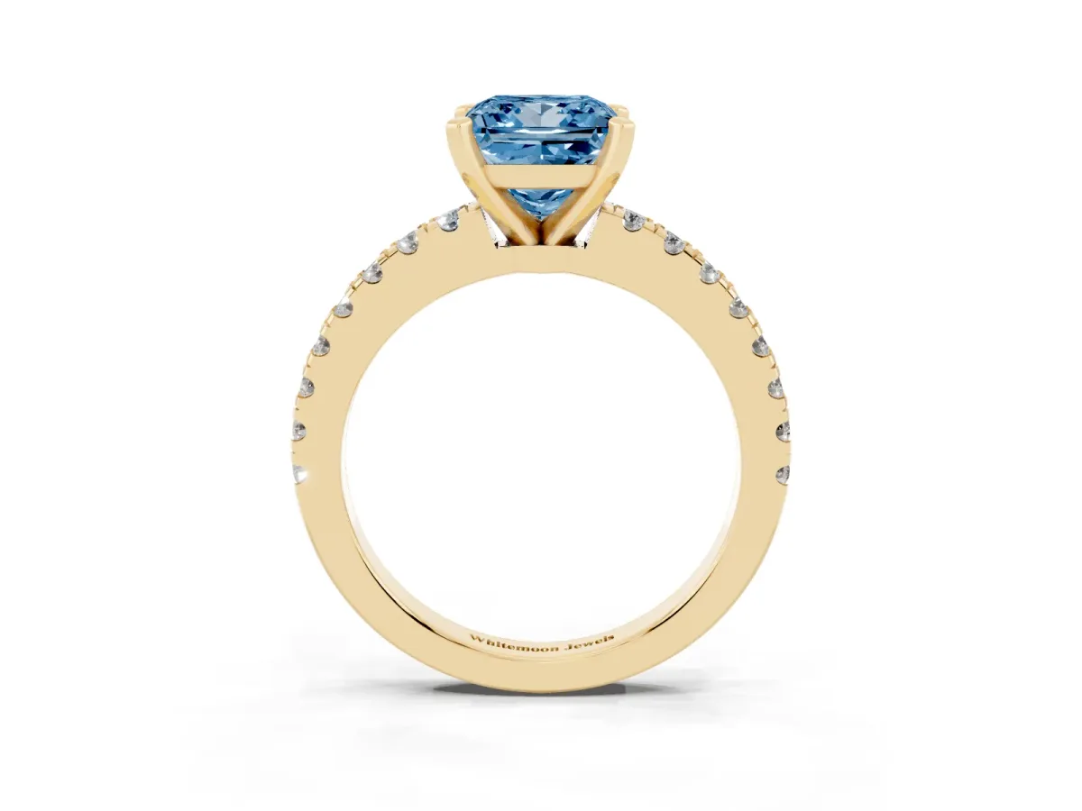 Fancy Blue Princess Cut Solitaire Diamond with Pavé Band and Four-Prong Setting Yellow gold