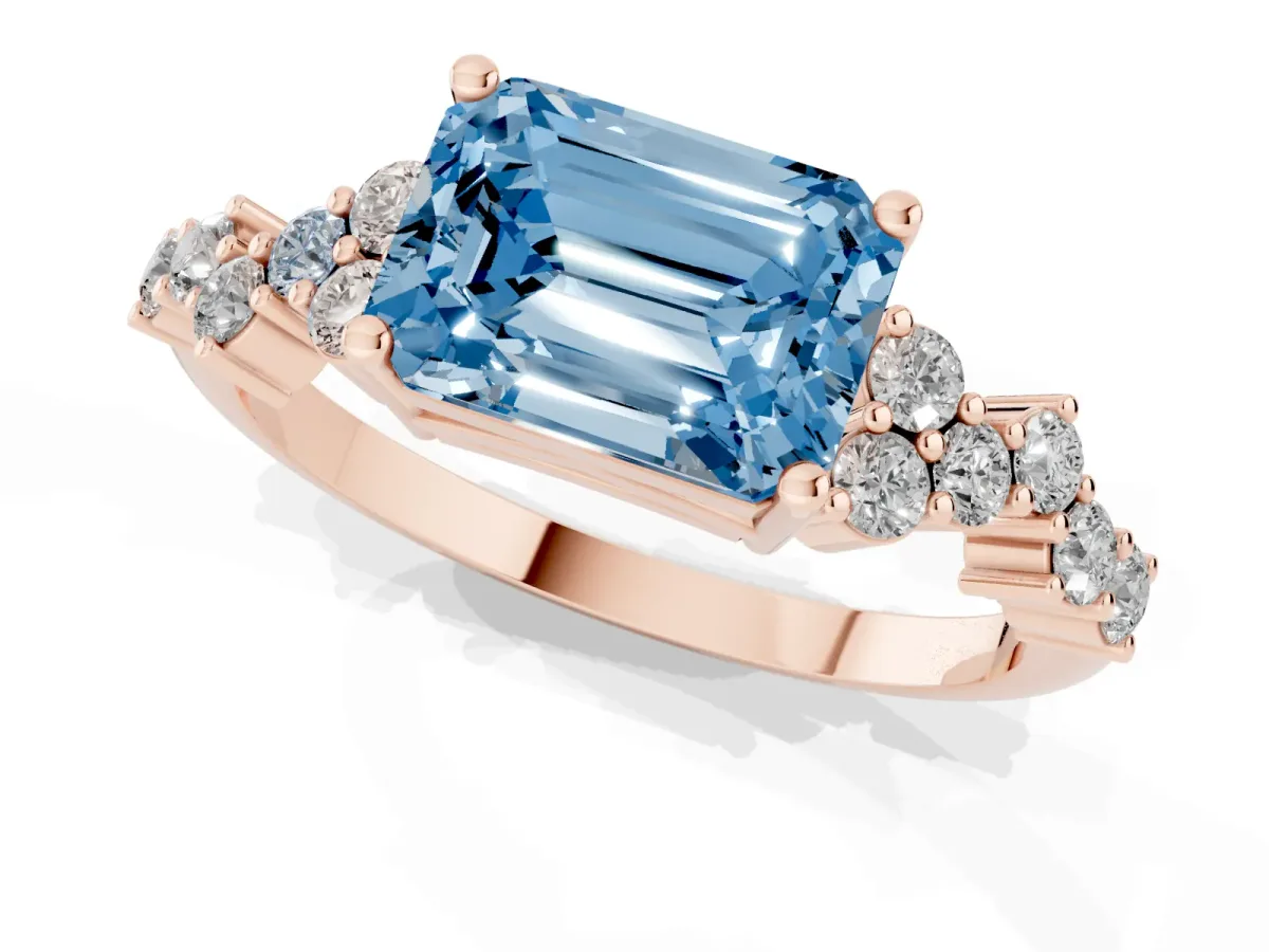 Fancy Blue Emerald Cut Diamond Scattered Round Accent Ring with Prong Setting Rose gold