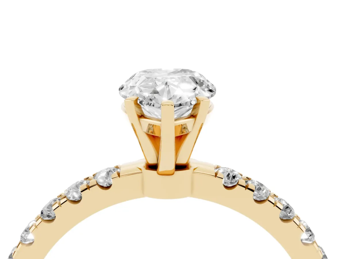 Pear Cut Diamond Solitaire Ring with Pavé Accents and Four-Prong Setting Yellow gold