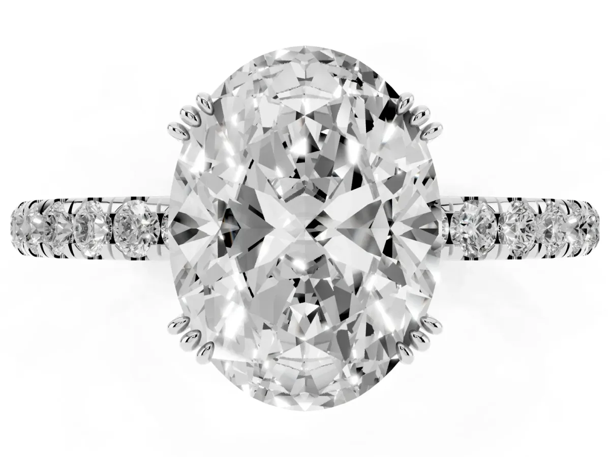 Oval Cut Brilliant Solitaire with Pavé Band and Claw Prong Setting Silver