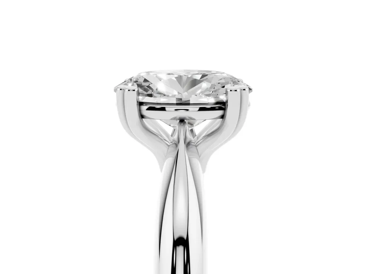 Oval Cut Cut Solitaire Engagement Ring with Tapered Band and Four-Prong Setting Silver
