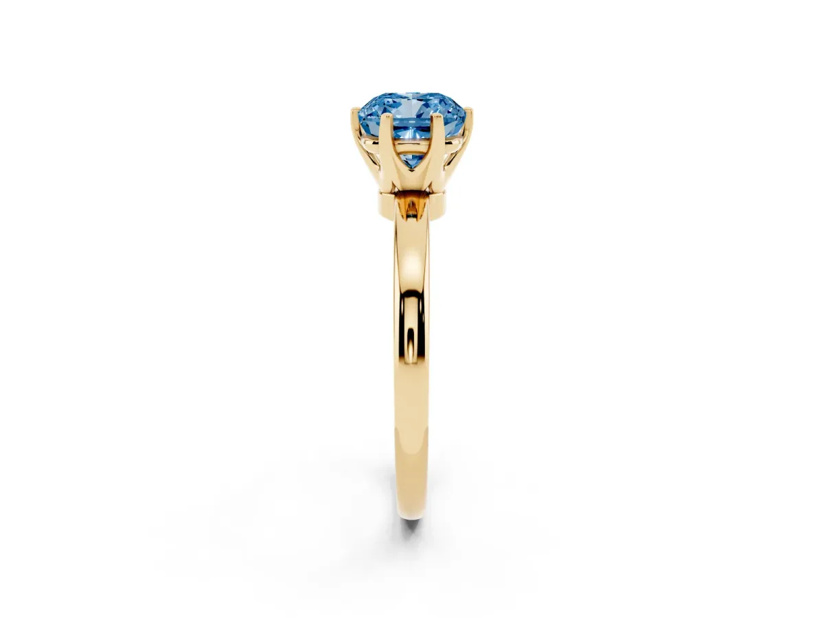 Fancy Blue Cushion Cut Solitaire Diamond Ring with Six-Prong Setting on a Classic Band Yellow gold