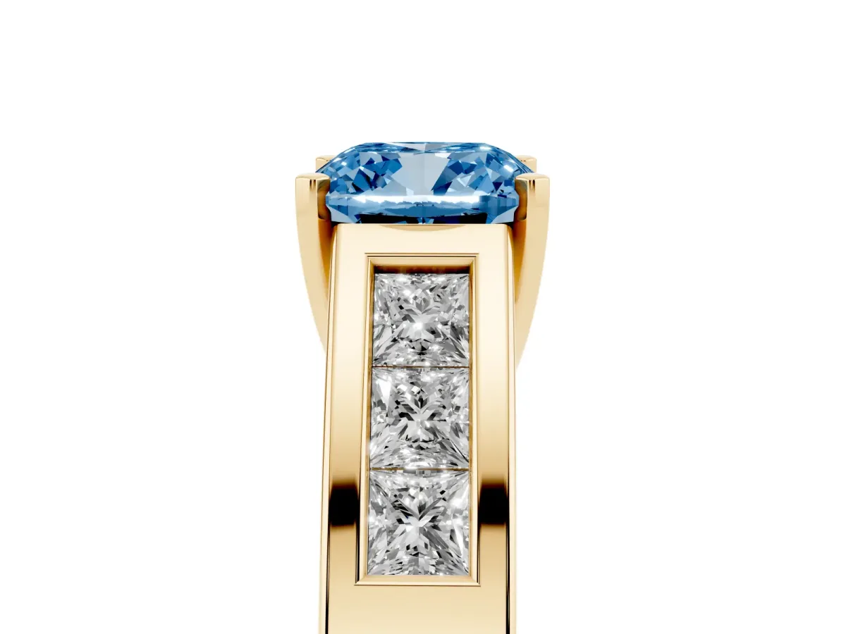 Fancy Blue Cushion Cut Cut Channel Set Solitaire Ring with Four-Prong Setting Yellow gold